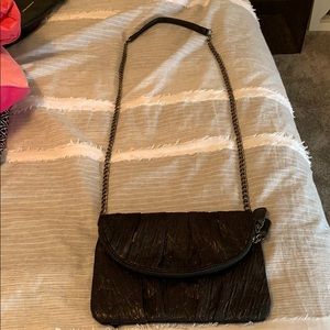 Black clutch with long shoulder strap